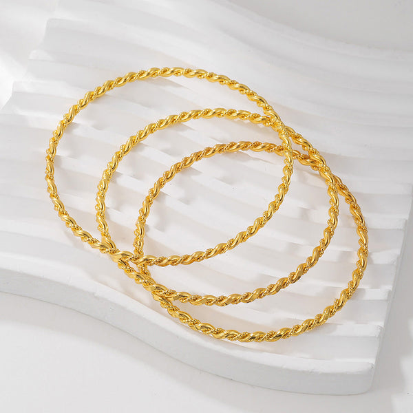 Elegant Twist Gold Bracelet